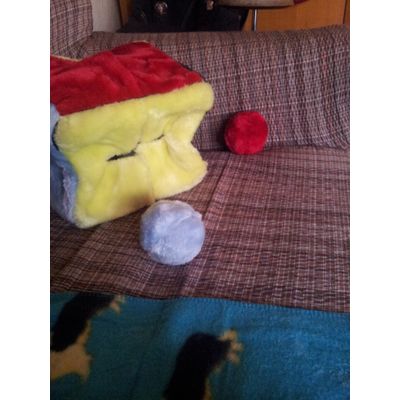 Dado con dos de sus cuatro pelotas